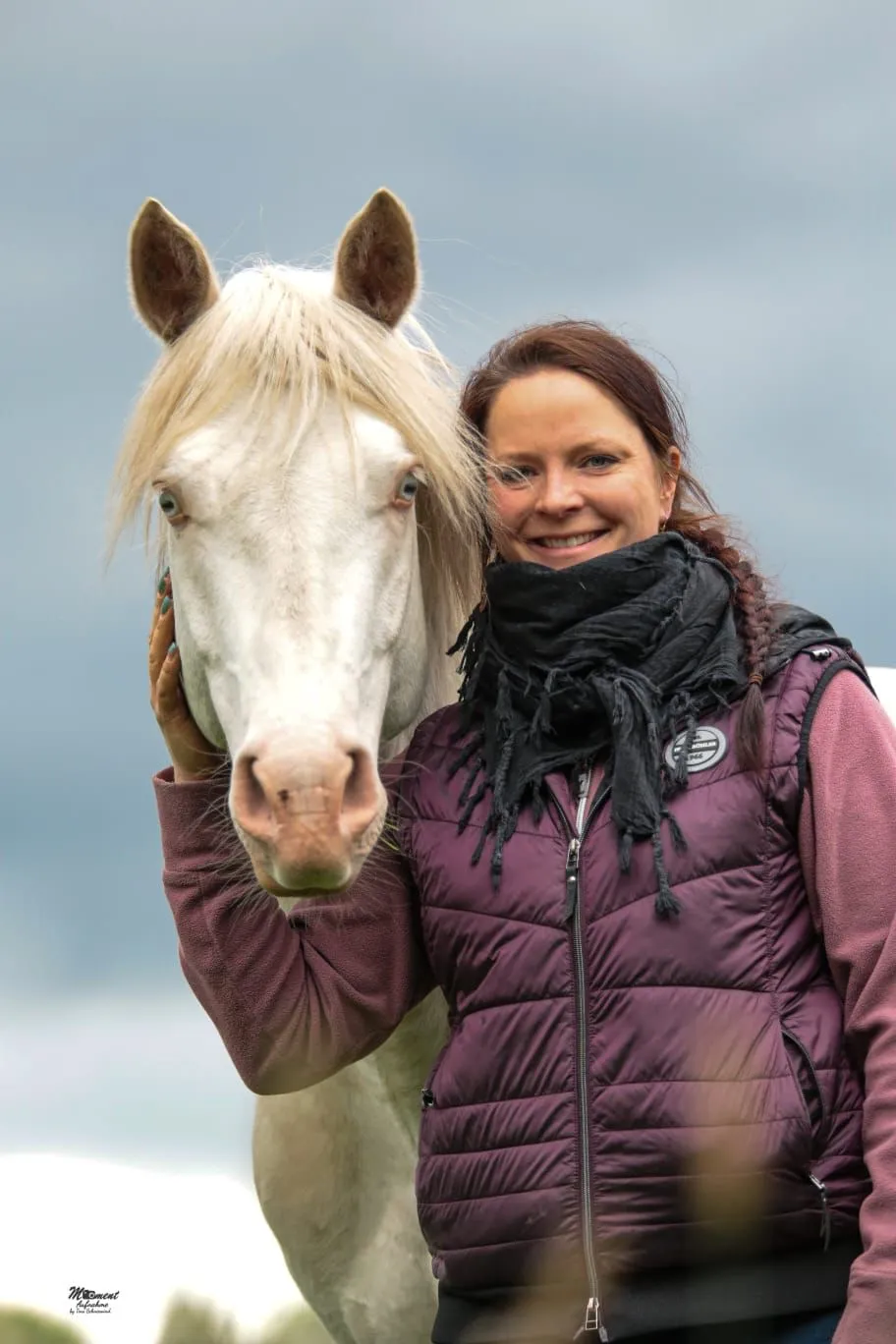 Me standing on my horse.
